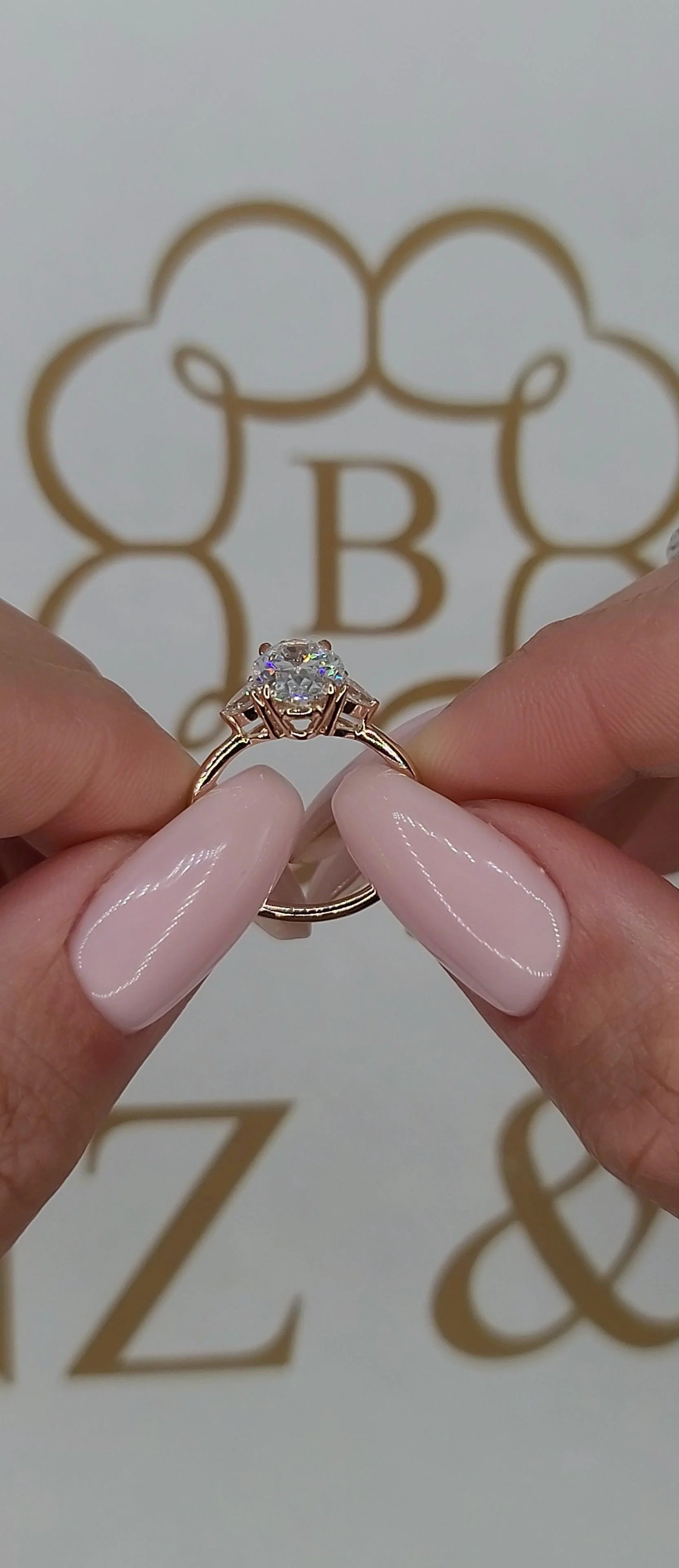 2.37 Carats Lab Grown Oval Cut with Pear Shape Side Stones Diamond Engagement Ring in Rose Gold - Image 3