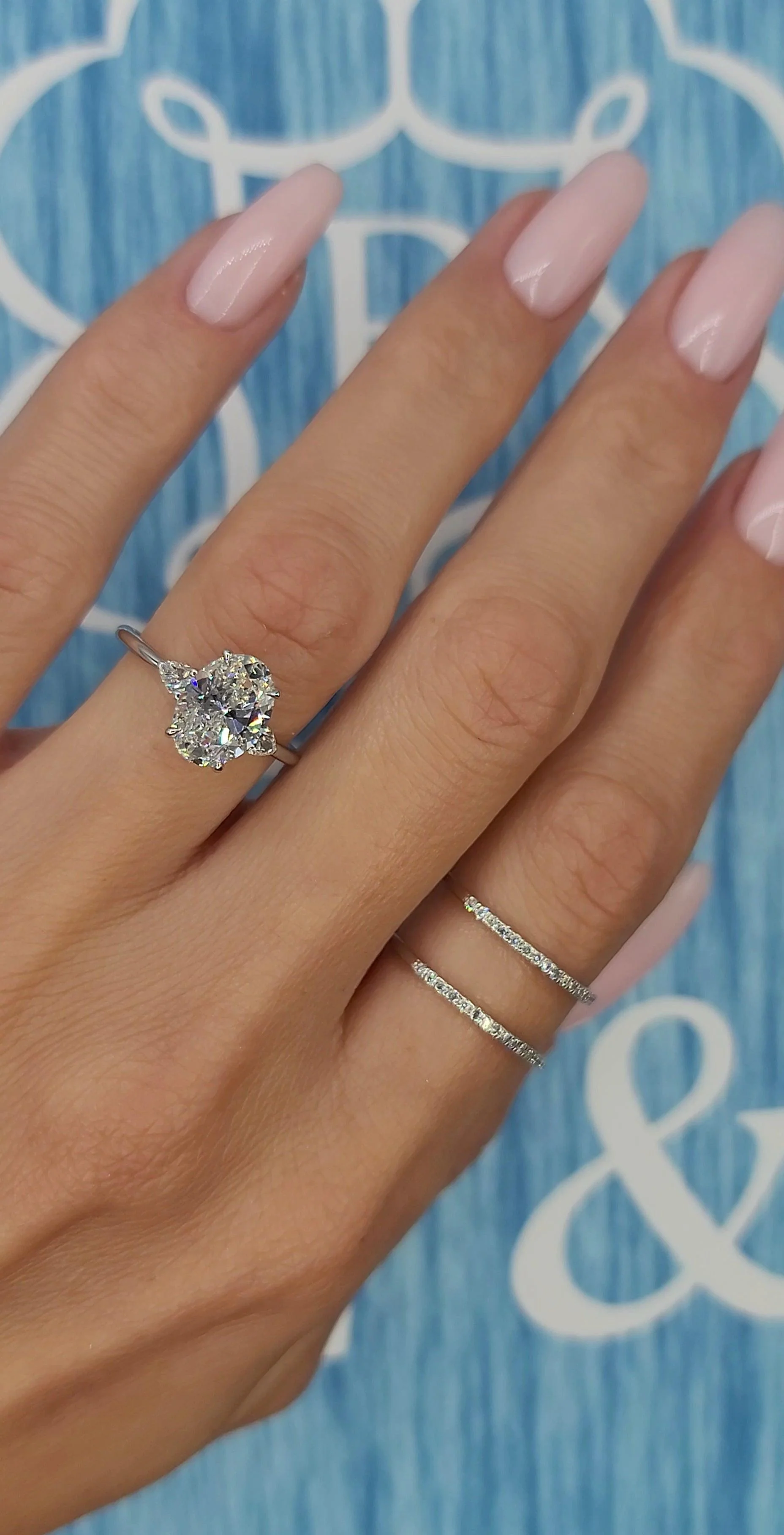 2.38 Carats Lab Grown Oval Cut with Pear Shape Side Stones Diamond Engagement Ring in White Gold - Image 3