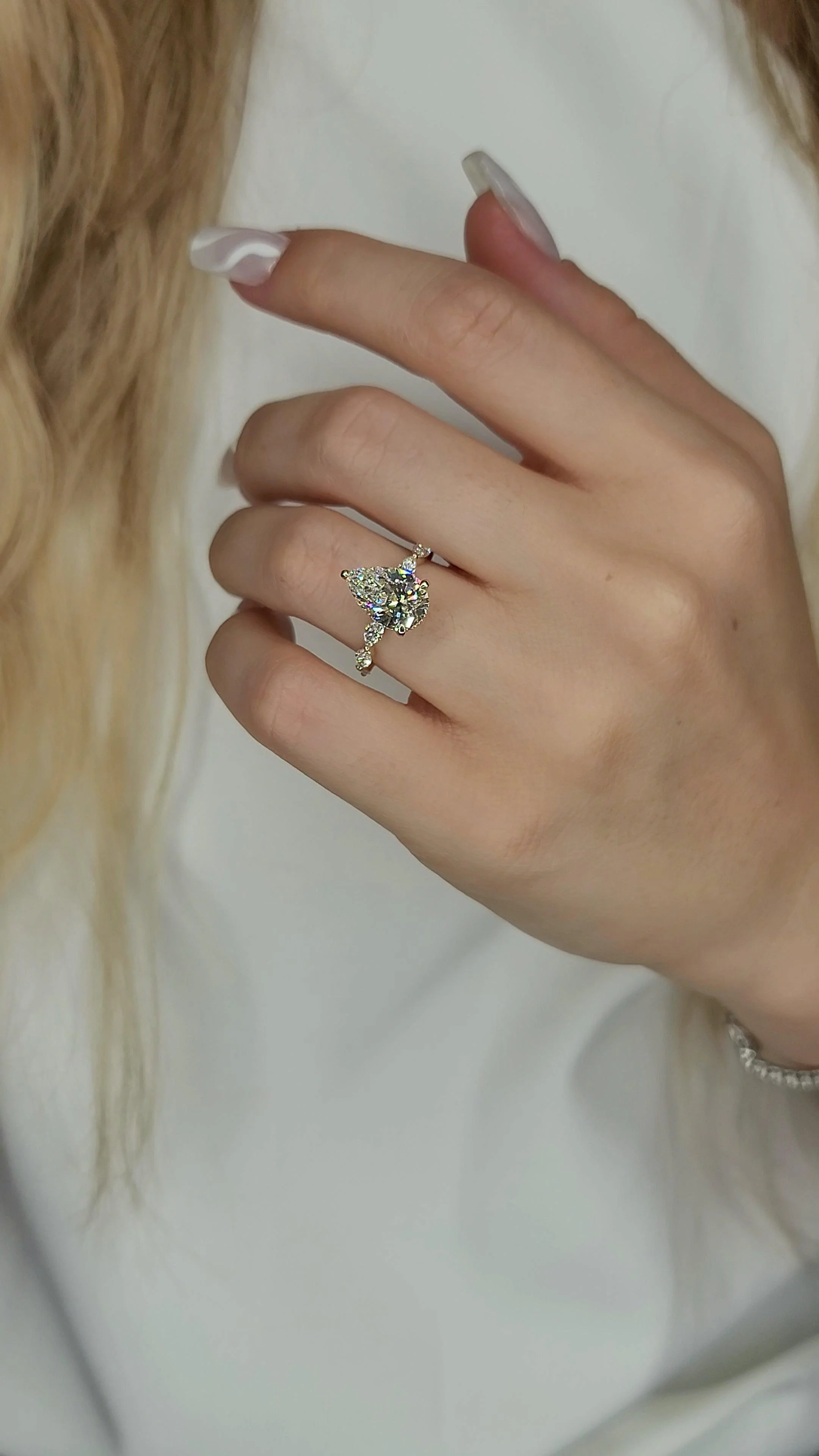 4.00 Carats Lab Grown Pear Shape with Marquise Side Stones Hidden Halo Diamond Engagement Ring Yellow Gold - Image 2